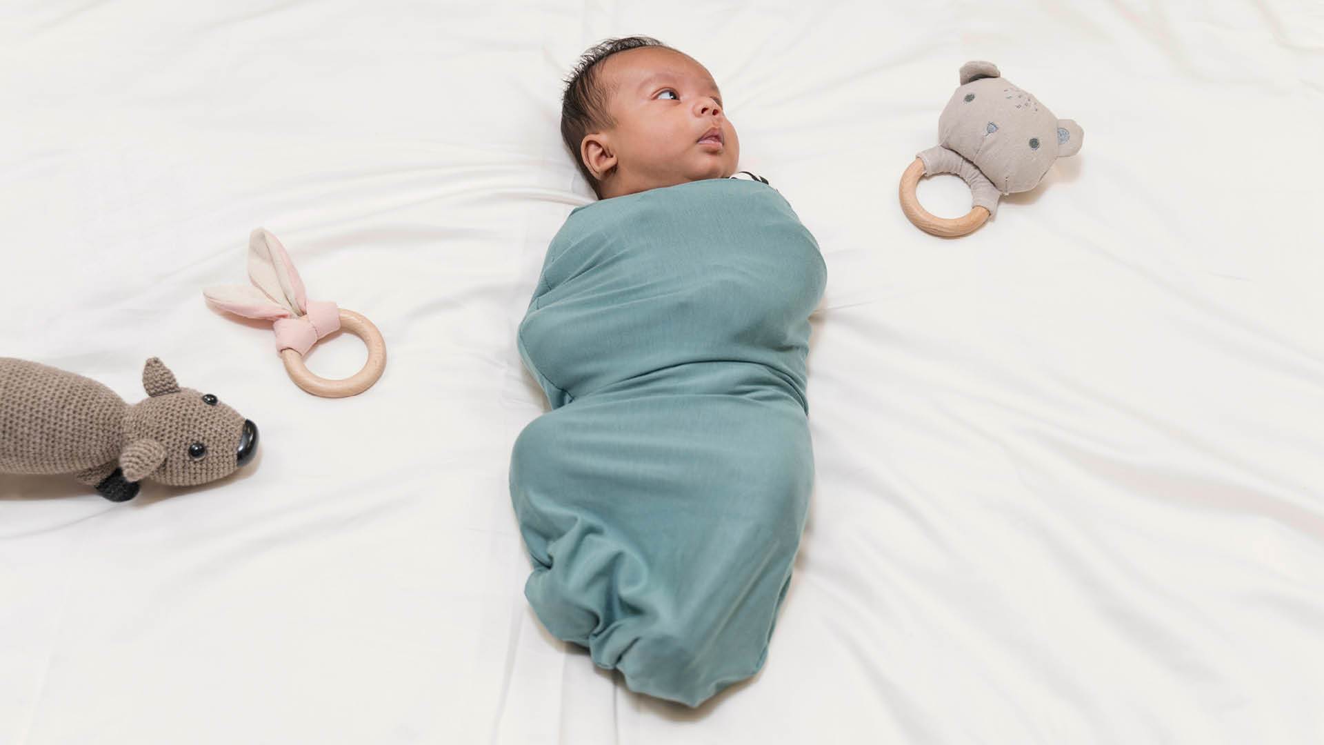 A781 Newborn Swaddle with Matching Headband Lincraft New Zealand